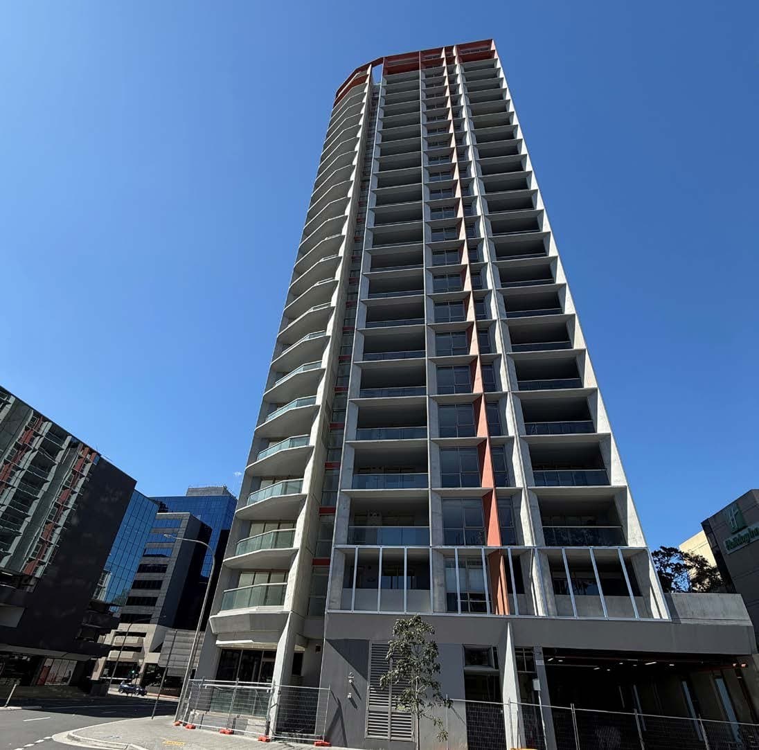 Scaffolded apartment building undergoing remedial works in New South Wales